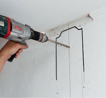 Tyst köksfläkt: Borra hål i väggen Tyst köksfläkt: Borra hål i väggen